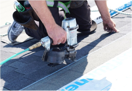 Man Working for Shingle Repair in Calgary